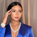 Ángela Aguilar enciende redes sociales por vestido rojo