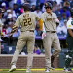 Machado llega a 31 jonrones y Padres vencen a Rockies 13-6